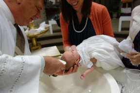 We hand John-Paul over to his Godparents for Baptism, knowing that He is a gift from God and that he does not belong to us. He is given to us as a blessing, that we may guide Him to Jesus. And he is also part of our sanctification! Our little Saint Maker.